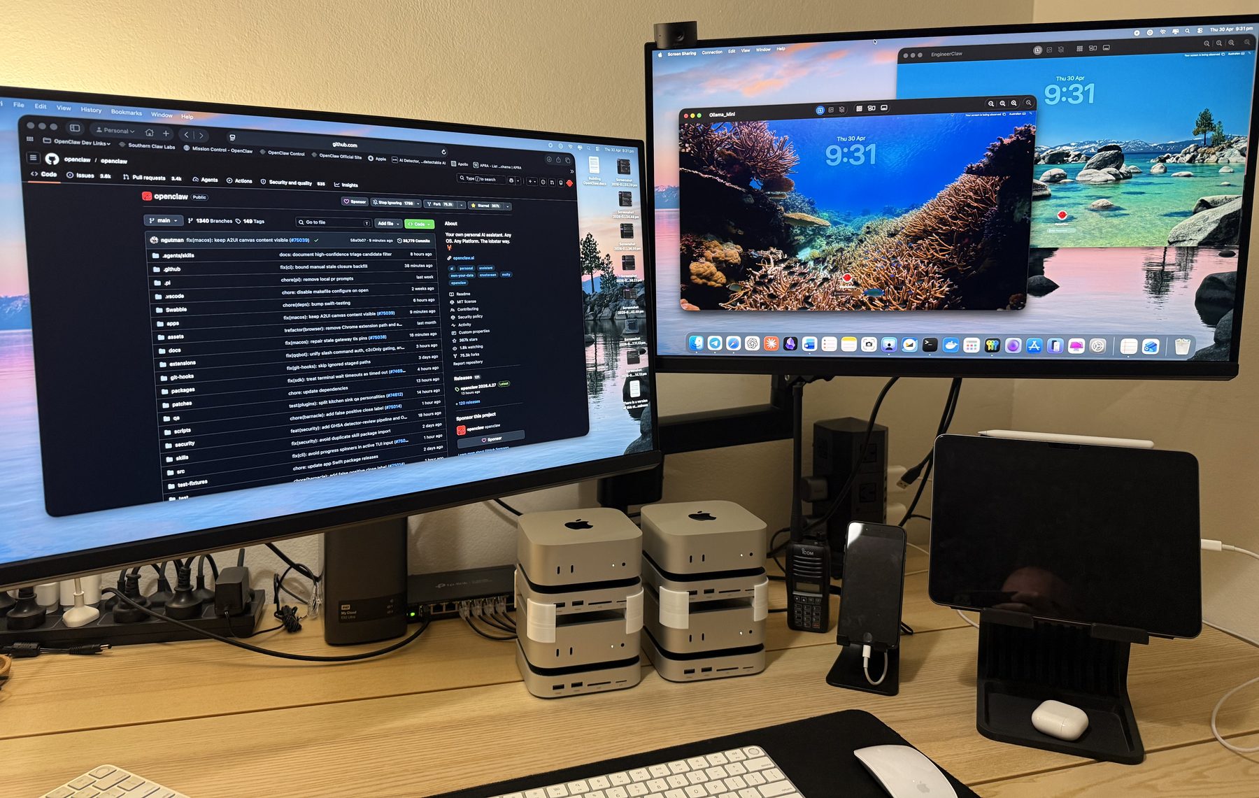 The sovereign AI environment in use: two displays showing agent sessions and screen shares of separate hosts, above a stacked cluster of Apple Silicon Mac minis and network hardware on a desk.
